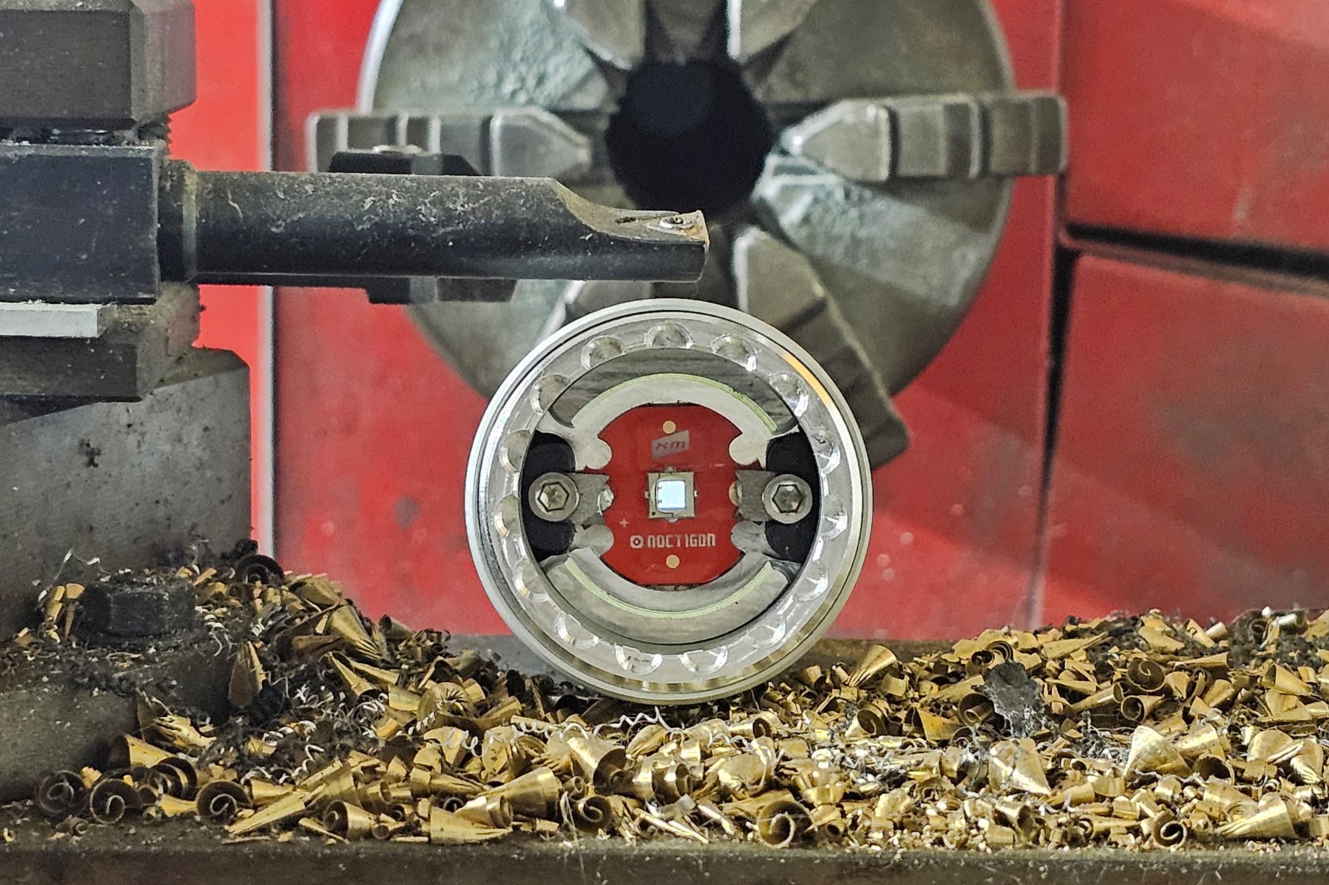 Lumenite II flashlight made by FrazLabs on the original manual lathe